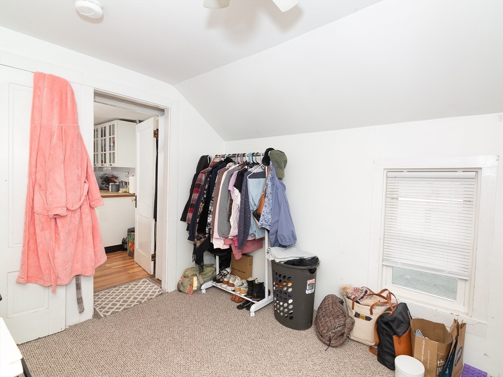 38 Depot Street Milford, MA 01757 - Photo 24 of 34 a view of walk in closet with clothes and shoes