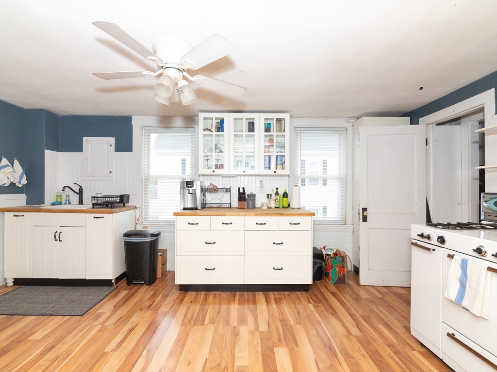 38 Depot Street Milford, MA 01757 - Photo 29 of 34 a room with a stove and a dishwasher