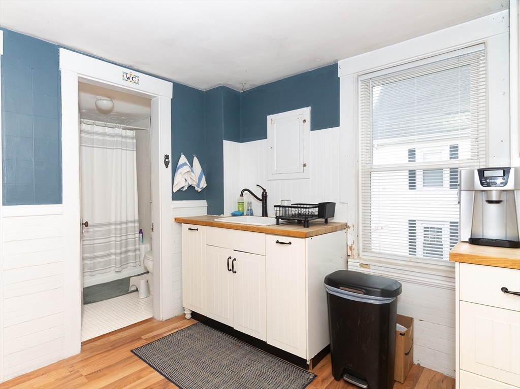 38 Depot Street Milford, MA 01757 - Photo 30 of 34 a kitchen with a sink and cabinets