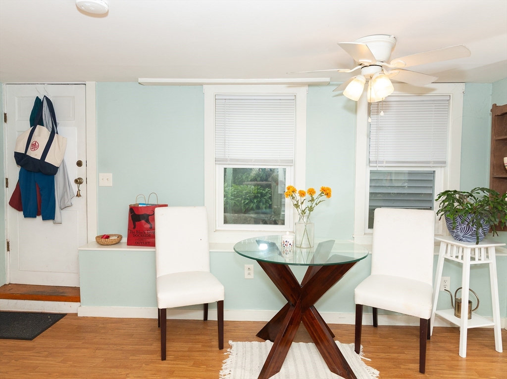 38 Depot Street Milford, MA 01757 - Photo 5 of 34 a view of a dining room with furniture and wooden floor