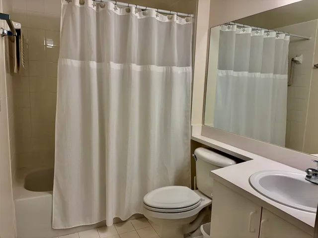 a bathroom with a sink and toilet