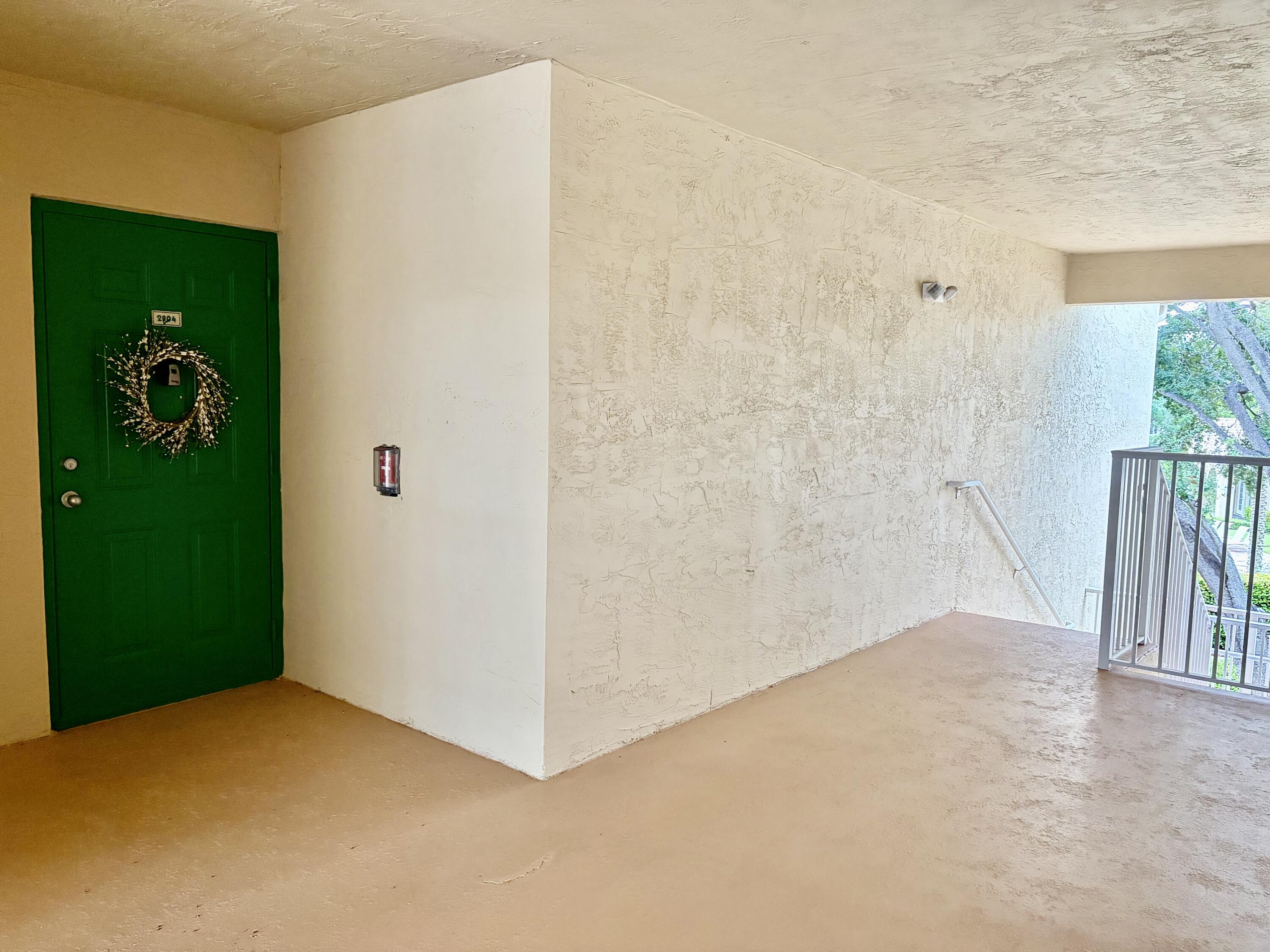242 Village Boulevard, Unit 2304 Tequesta, FL 33469 - Photo 34 of 34 a view of empty room with floor to ceiling window