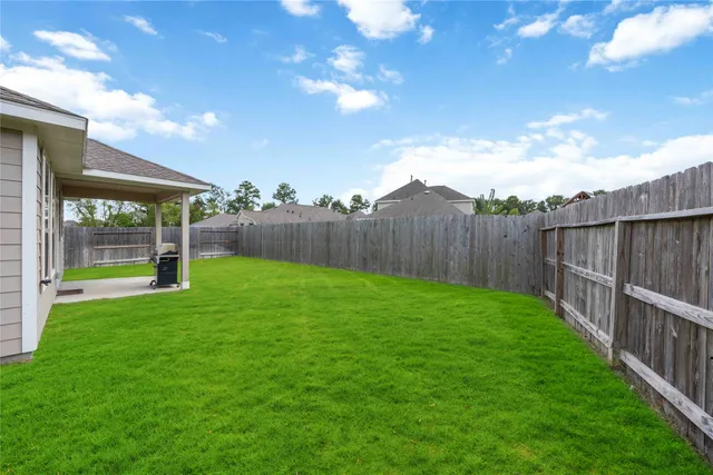 a view of a backyard with a garden