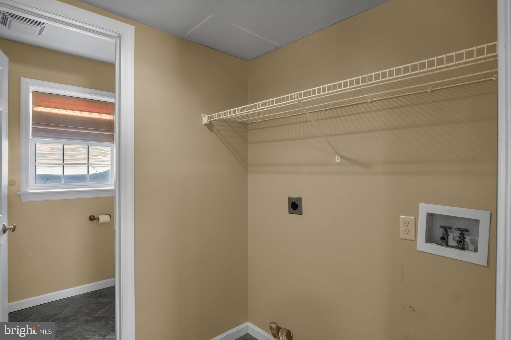 169 Covered Bridge Road Elizabethtown, PA 17022 - Photo 19 of 33 Spacious utility area with natural light.