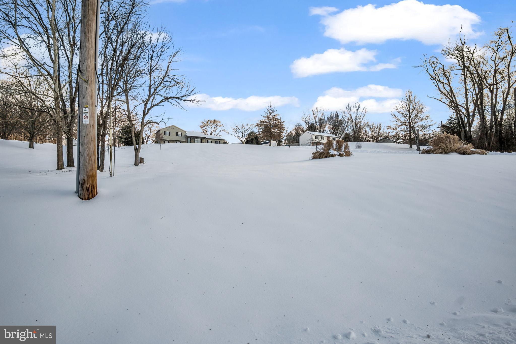 169 Covered Bridge Road Elizabethtown, PA 17022 - Photo 2 of 33 Serene winter landscape blanketed in snow.
