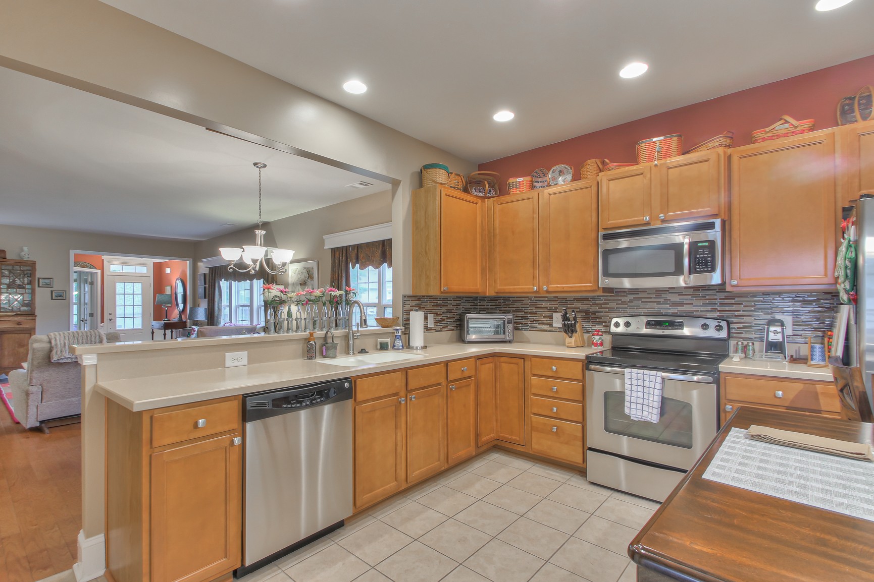 396 Blockade Lane Mount Juliet, TN 37122 - Photo 11 of 30 a kitchen with stainless steel appliances granite countertop a sink and cabinets