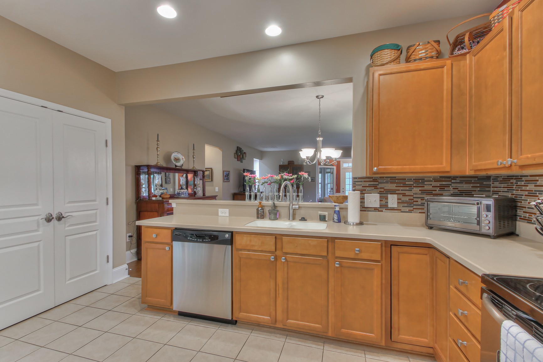 396 Blockade Lane Mount Juliet, TN 37122 - Photo 12 of 30 a kitchen with cabinets a sink and appliances