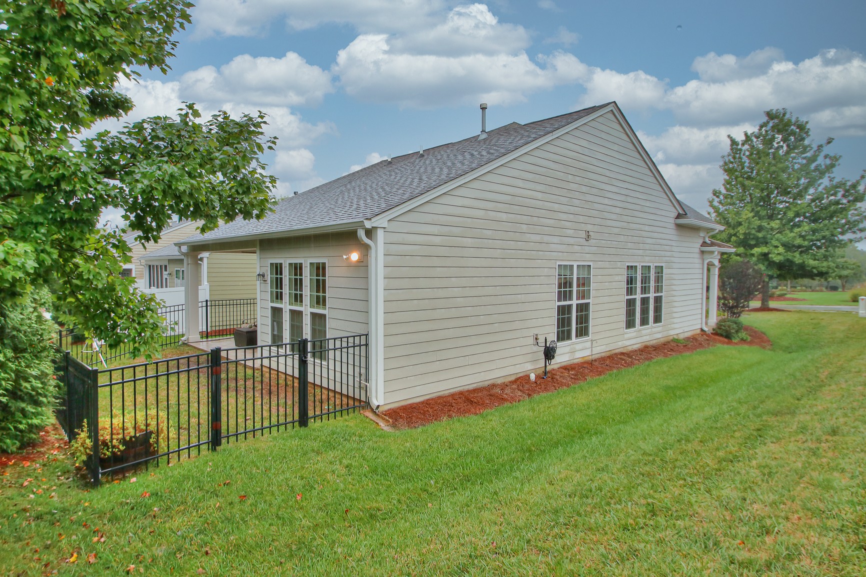 396 Blockade Lane Mount Juliet, TN 37122 - Photo 23 of 30 a view of a house with a yard and a garden