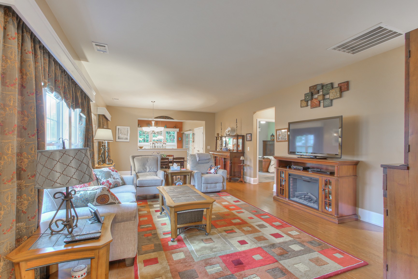 396 Blockade Lane Mount Juliet, TN 37122 - Photo 4 of 30 a living room with fireplace furniture and a rug