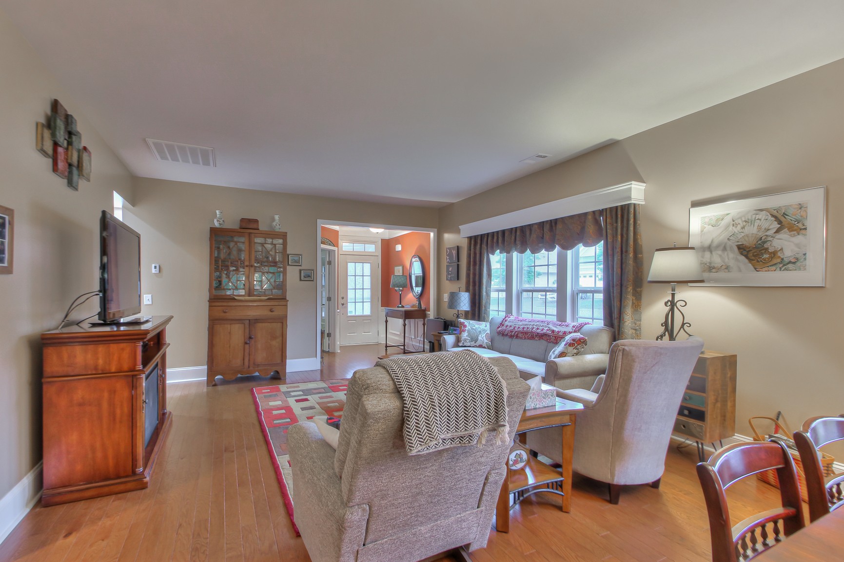 396 Blockade Lane Mount Juliet, TN 37122 - Photo 7 of 30 a living room with furniture fireplace and flat screen tv