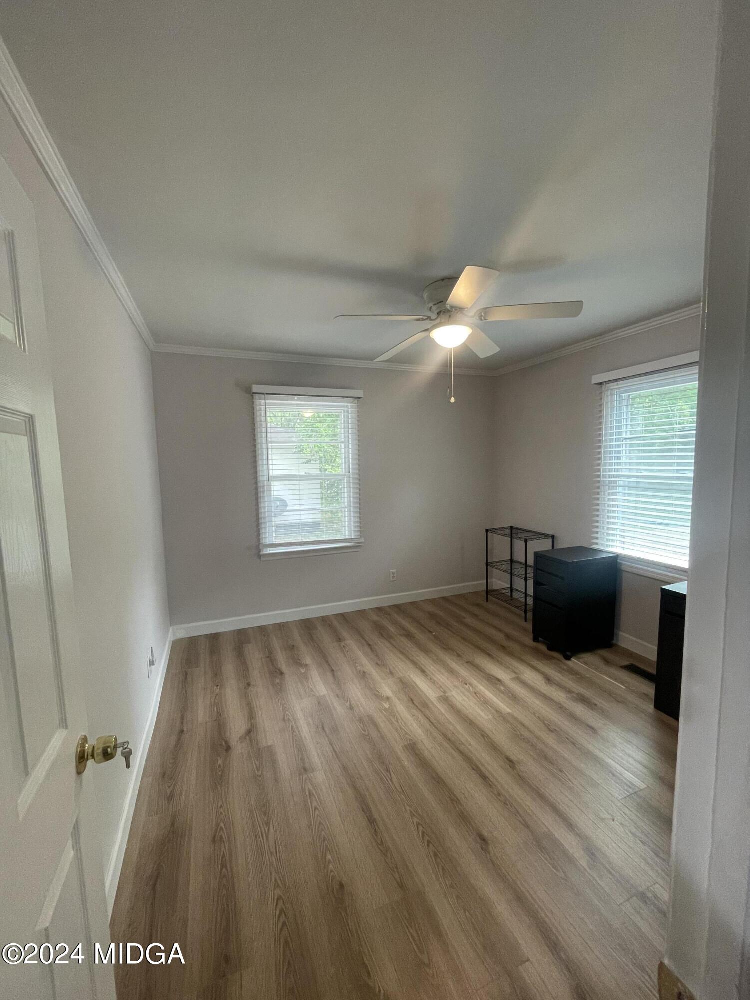 4064 Emory Drive Macon, GA 31206 - Photo 16 of 37 a view of an empty room with a window