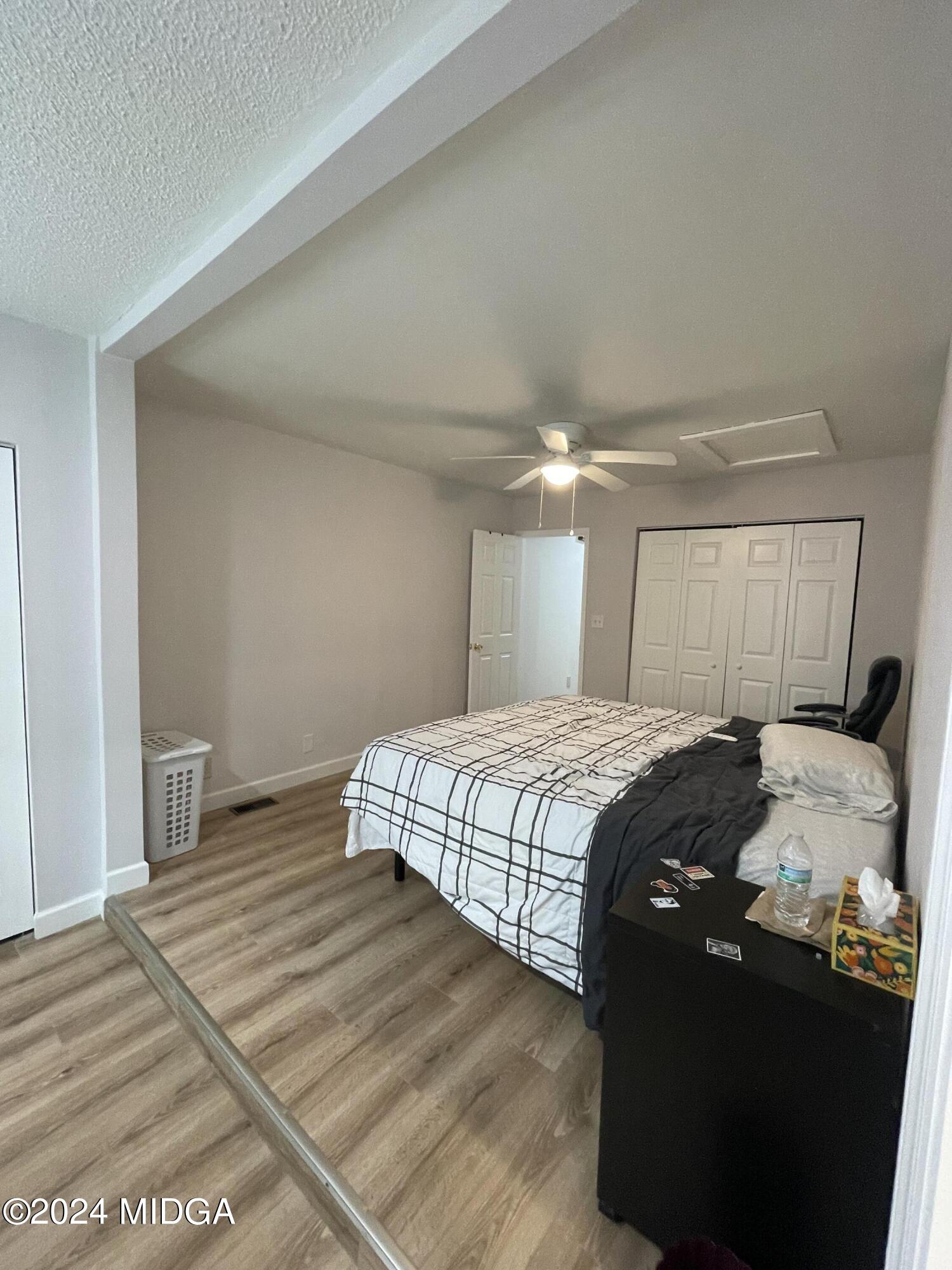 4064 Emory Drive Macon, GA 31206 - Photo 21 of 37 a bedroom with a bed and a window
