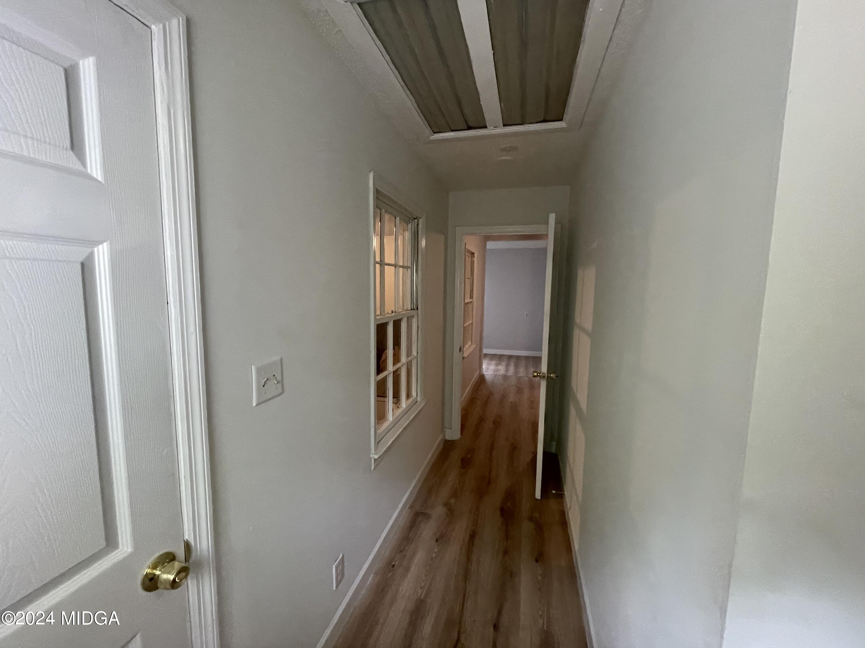 4064 Emory Drive Macon, GA 31206 - Photo 29 of 37 a view of a hallway with a glass door