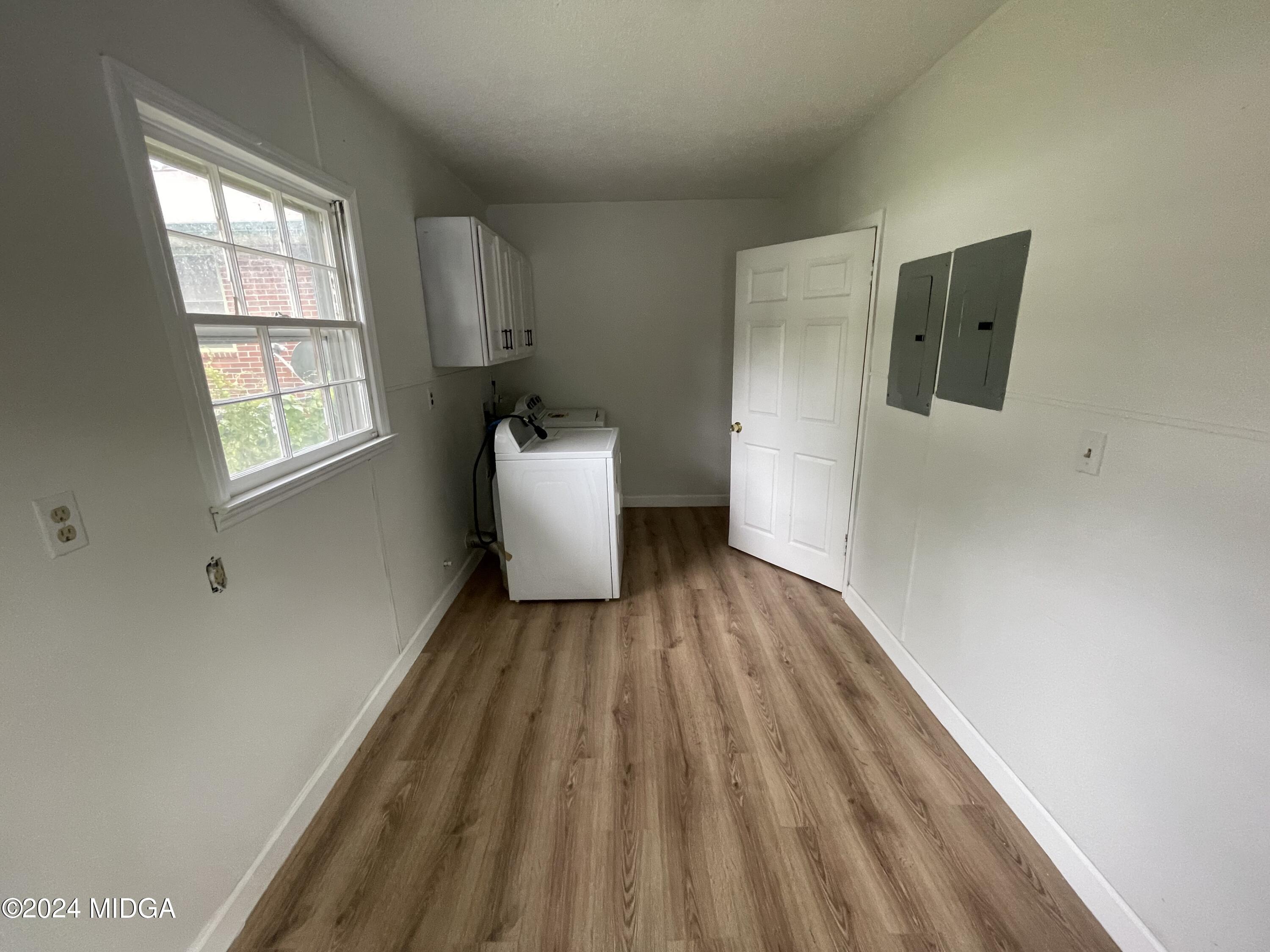 4064 Emory Drive Macon, GA 31206 - Photo 36 of 37 a view of a room with wooden floor and windows