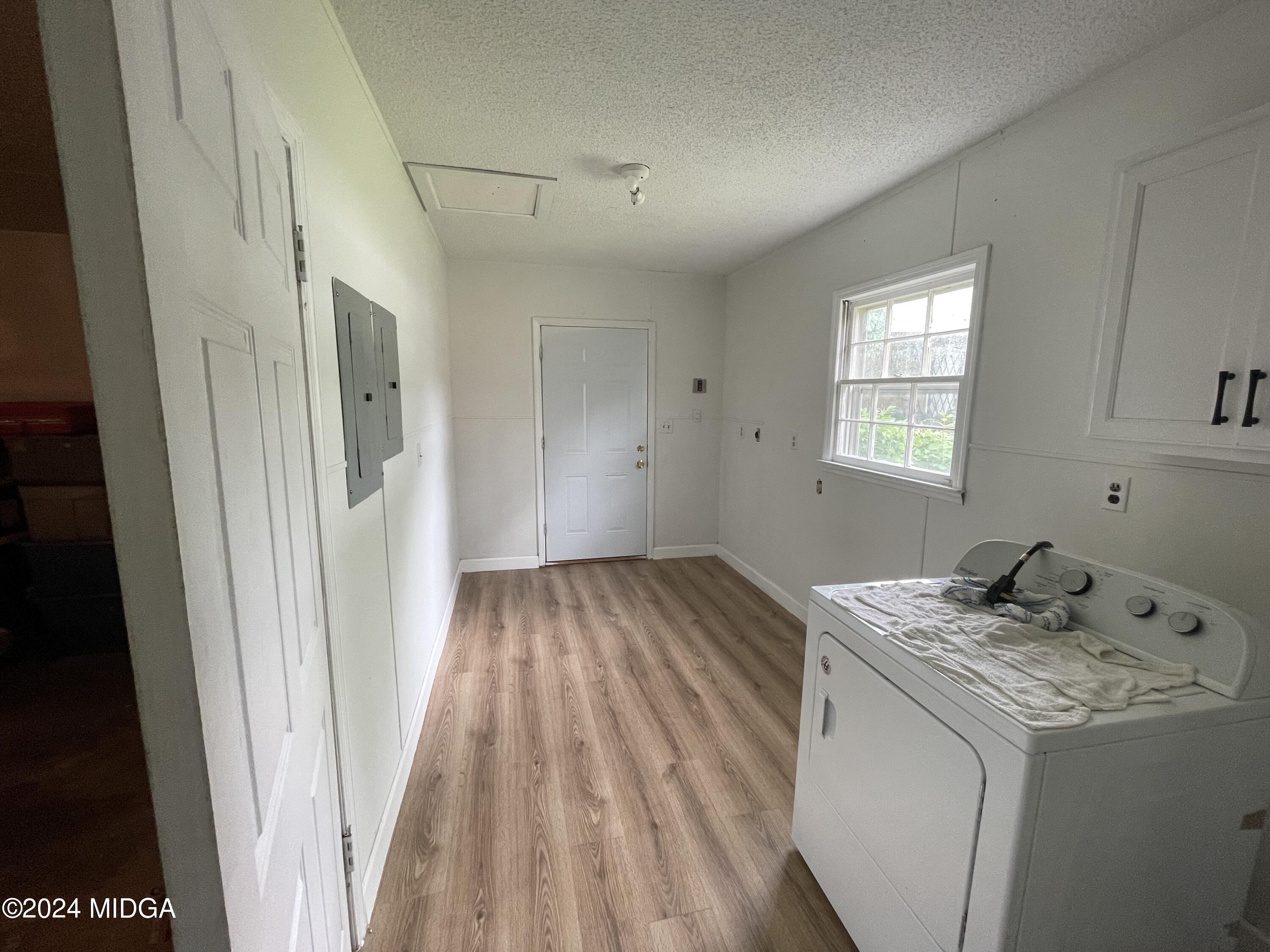 4064 Emory Drive Macon, GA 31206 - Photo 37 of 37 a view of a kitchen from a hallway