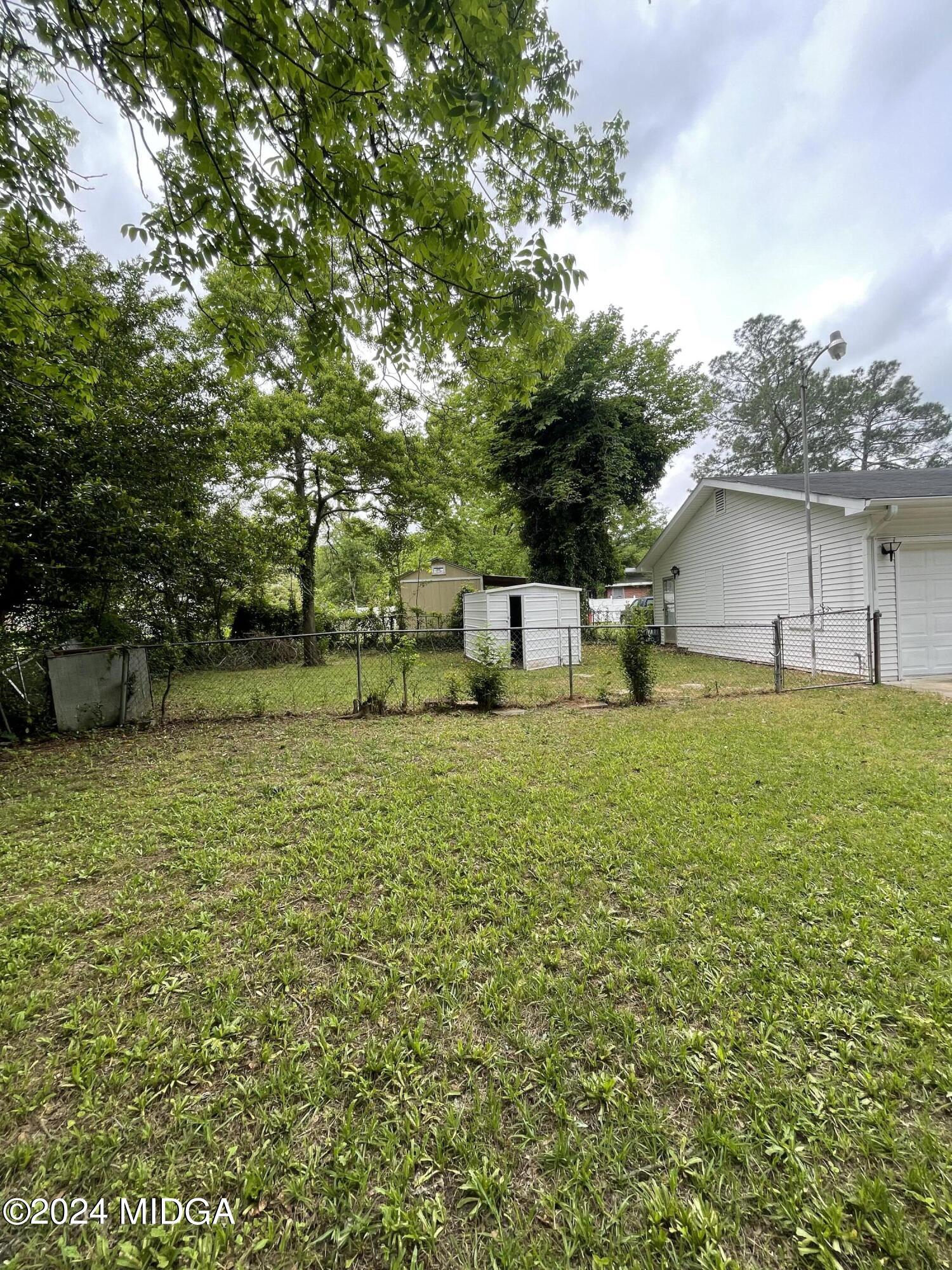 4064 Emory Drive Macon, GA 31206 - Photo 4 of 37 a house view with a garden space