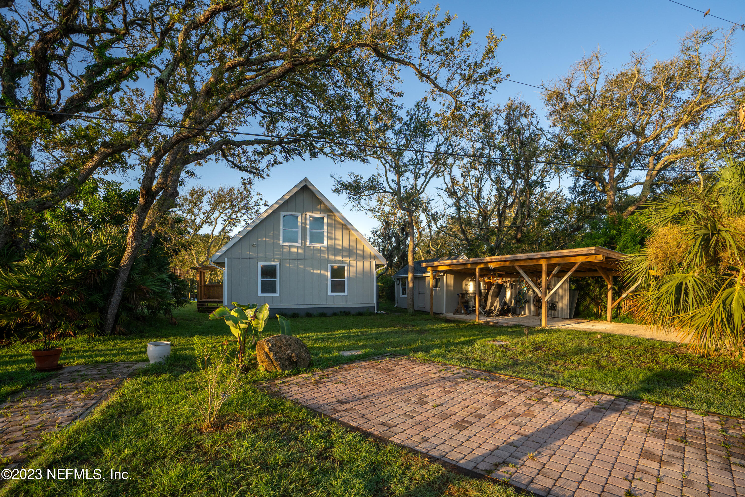 281 Ole Road St. Augustine, FL 32080 - Photo 15 of 61 a front view of a house with garden