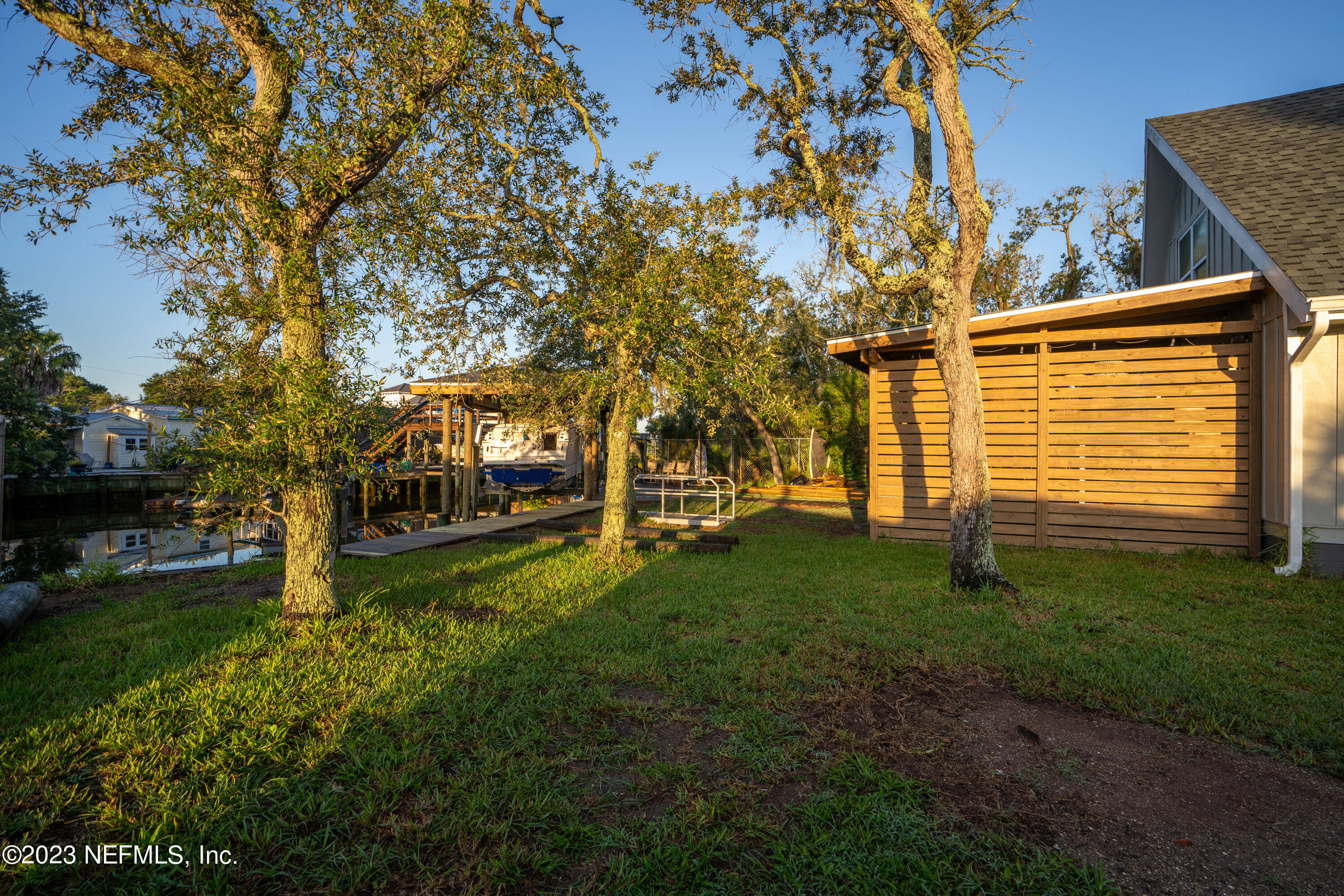 281 Ole Road St. Augustine, FL 32080 - Photo 20 of 61 a view of a yard with plants and trees