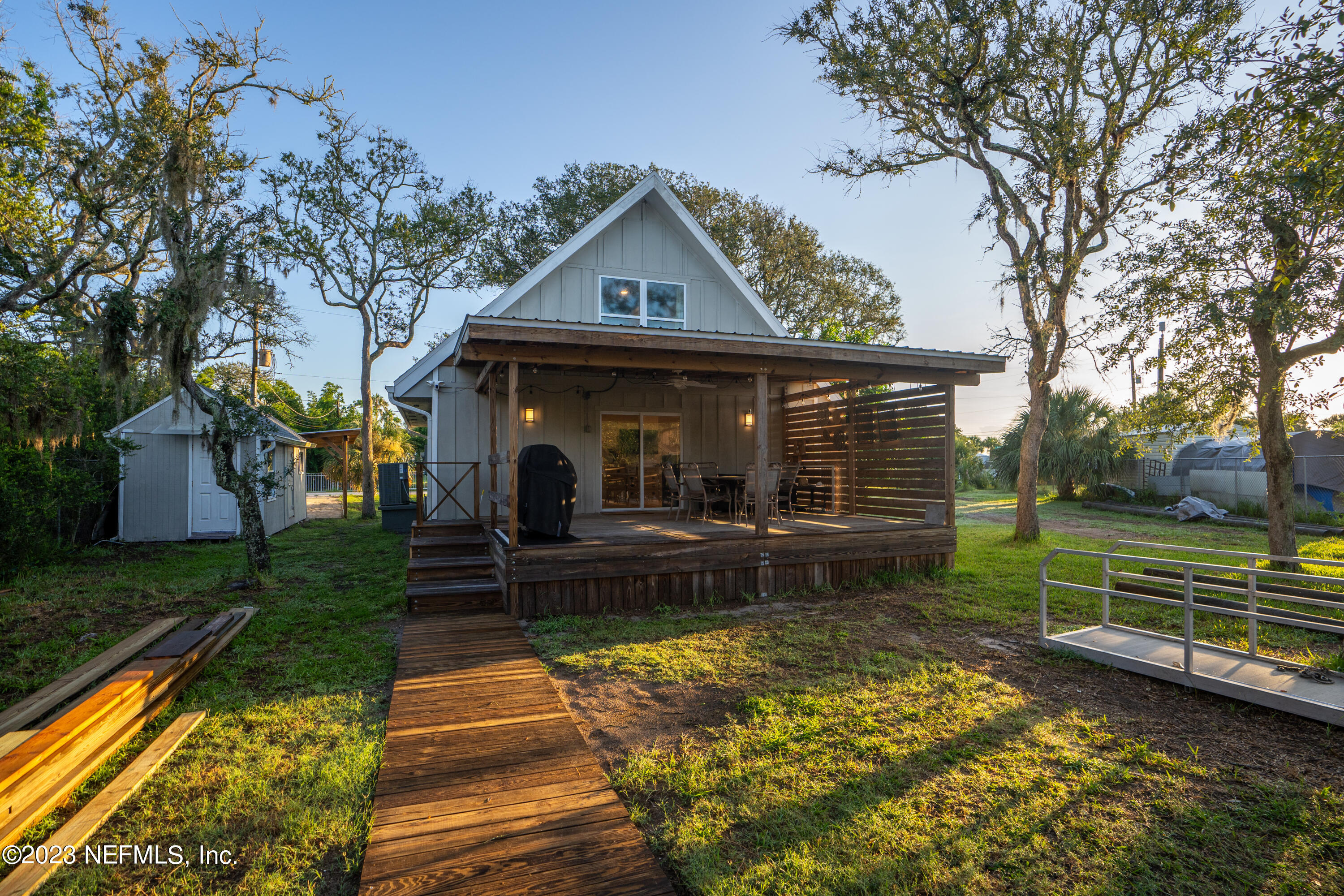 281 Ole Road St. Augustine, FL 32080 - Photo 24 of 61 a front view of a house with garden