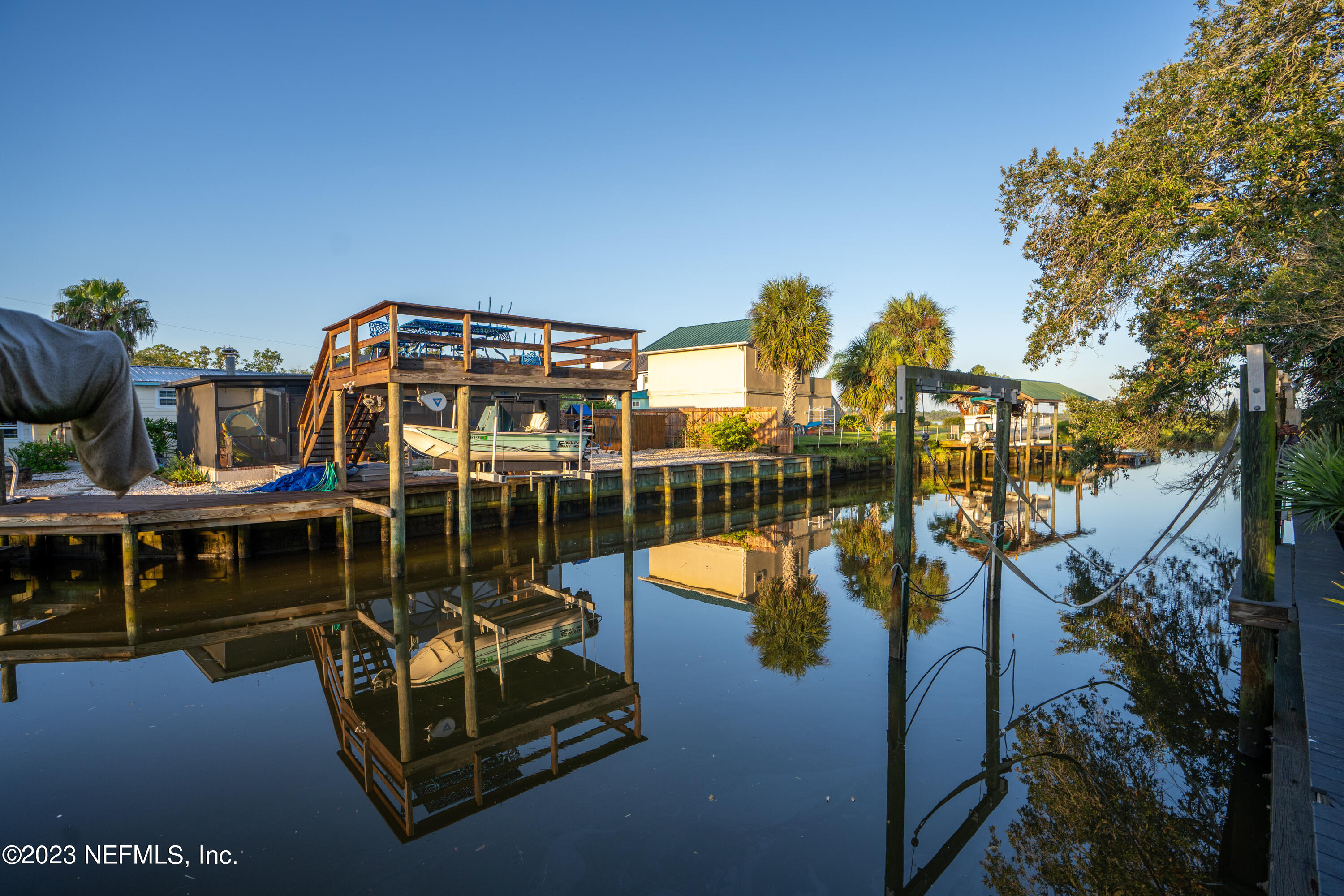 281 Ole Road St. Augustine, FL 32080 - Photo 27 of 61 a balcony with table and chairs