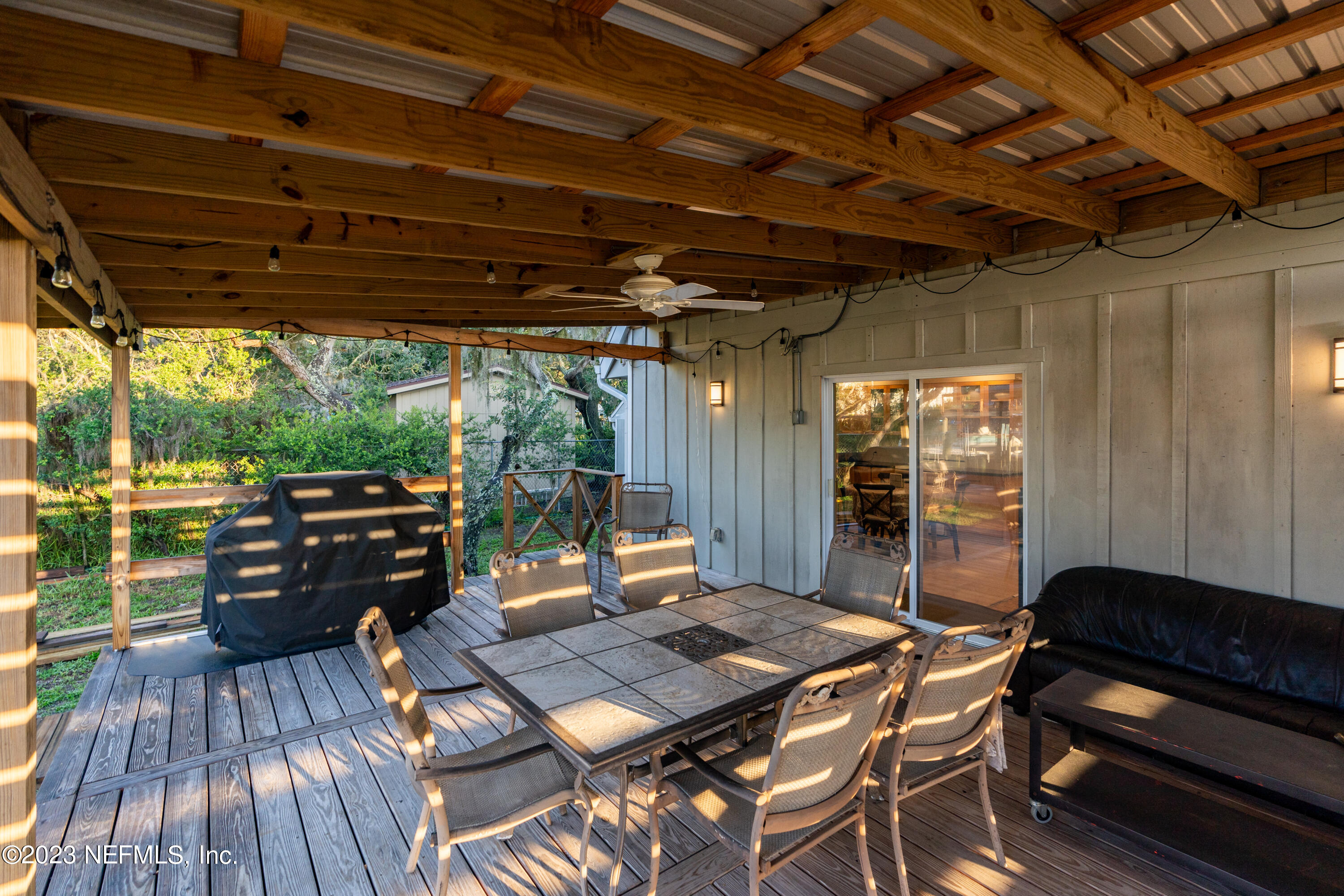 281 Ole Road St. Augustine, FL 32080 - Photo 31 of 61 a patio view with a couch and wooden floor