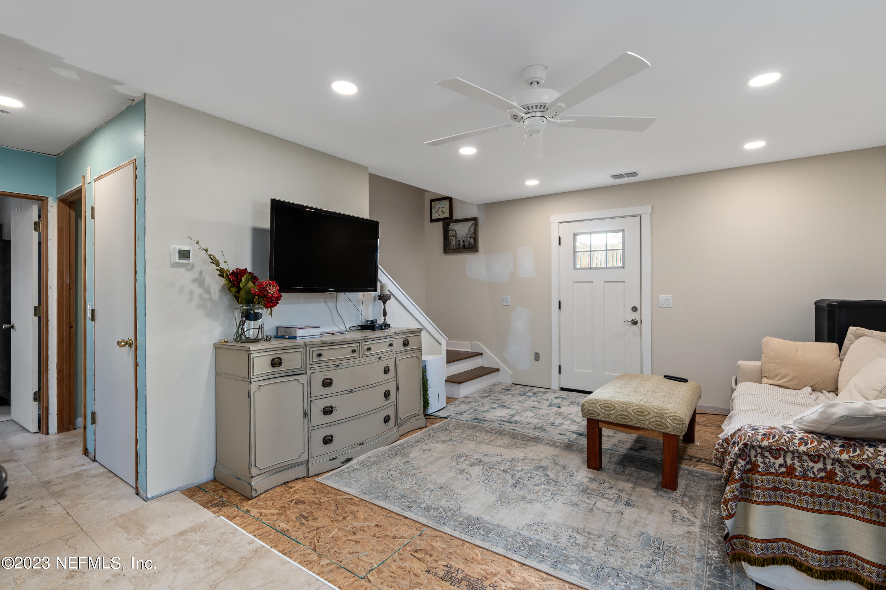 281 Ole Road St. Augustine, FL 32080 - Photo 36 of 61 a living room with furniture and a flat screen tv