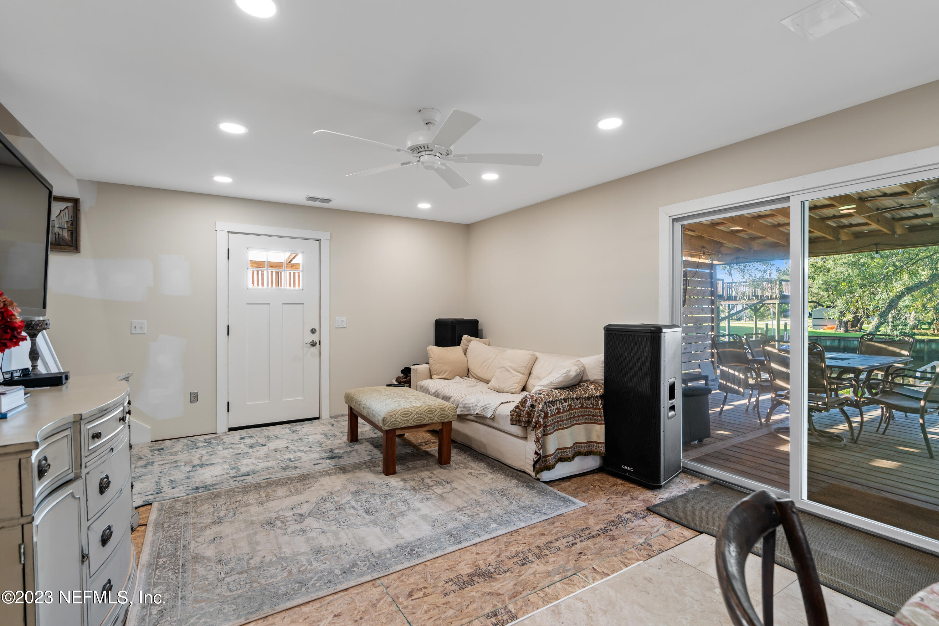 281 Ole Road St. Augustine, FL 32080 - Photo 37 of 61 a living room with furniture and a flat screen tv