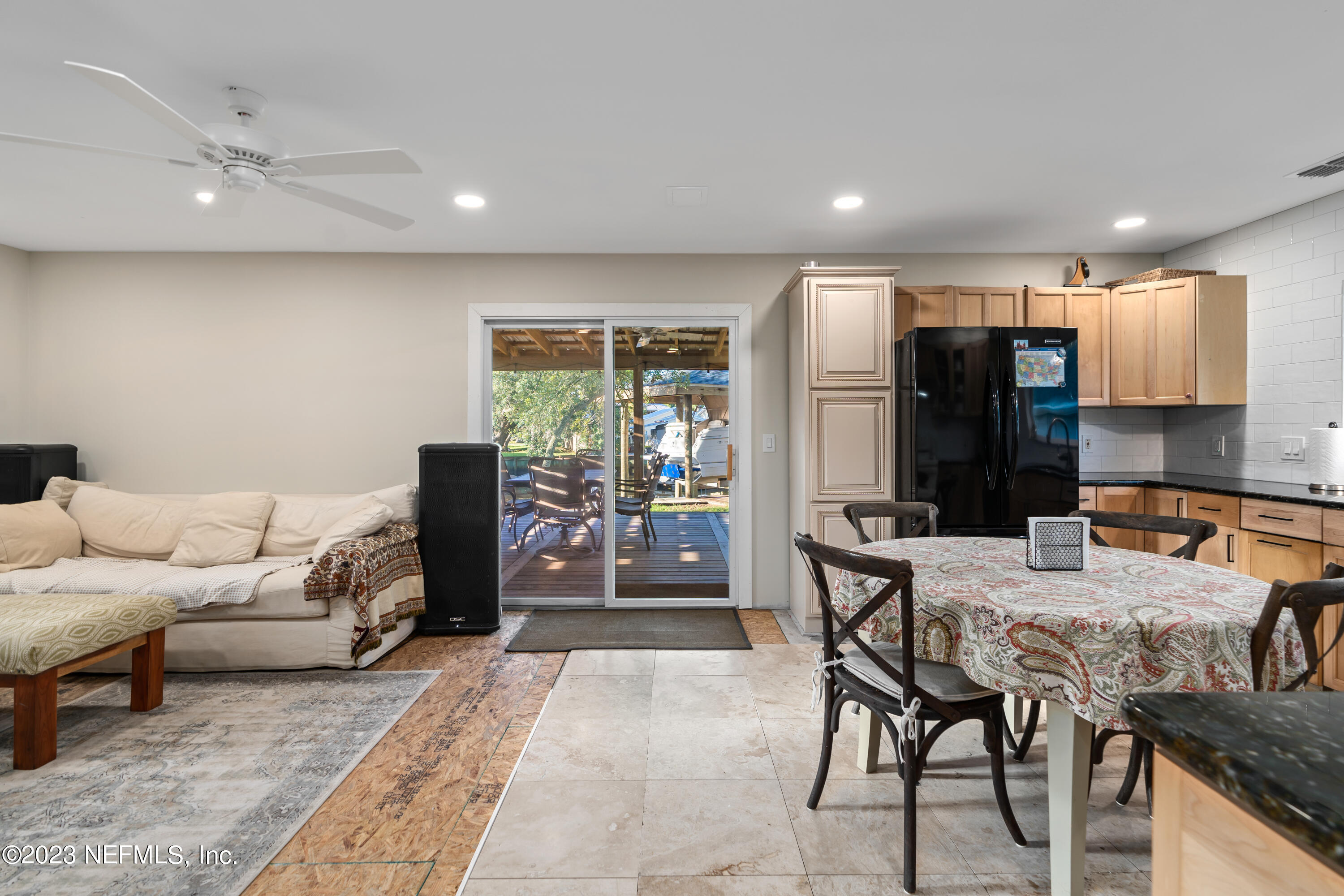 281 Ole Road St. Augustine, FL 32080 - Photo 38 of 61 a living room with furniture and a lamp