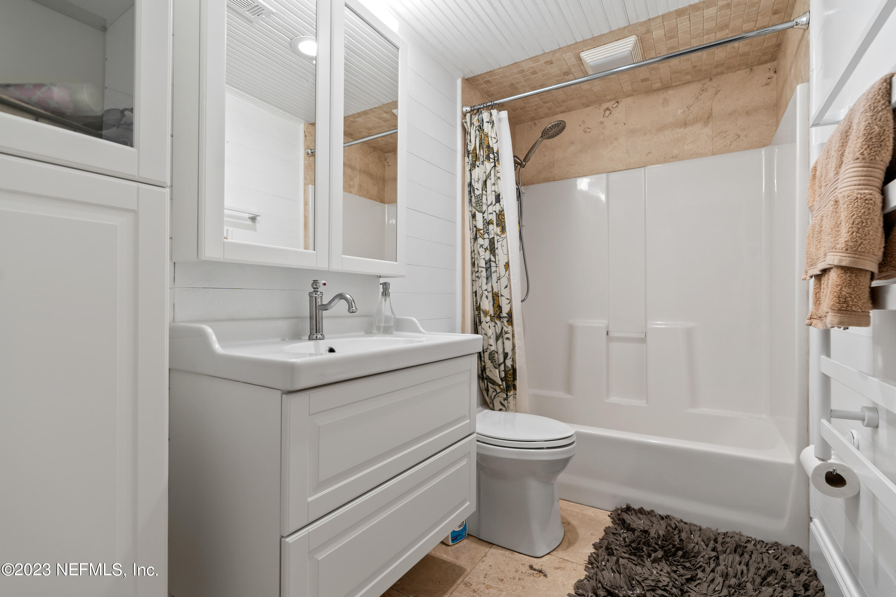 281 Ole Road St. Augustine, FL 32080 - Photo 42 of 61 a bathroom with a sink a toilet and a bathtub