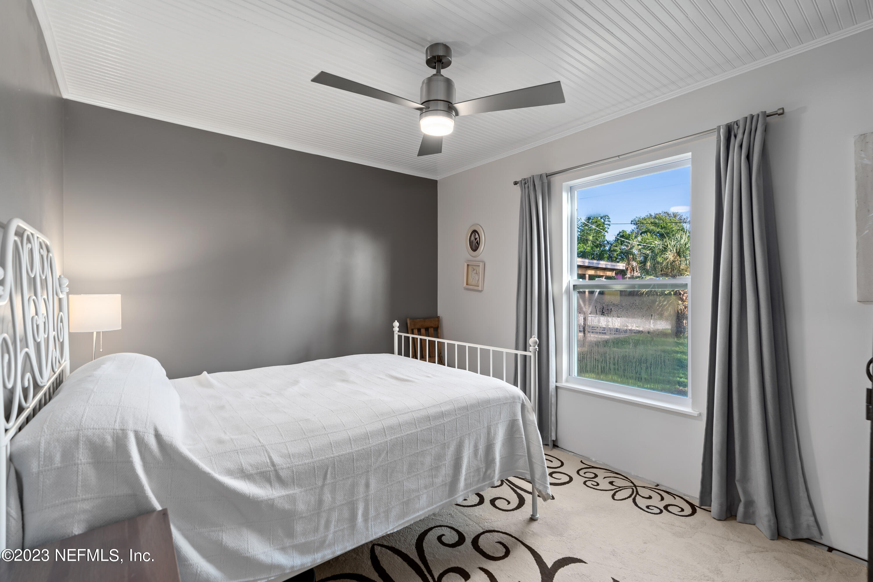 281 Ole Road St. Augustine, FL 32080 - Photo 44 of 61 a bedroom with a bed and a window