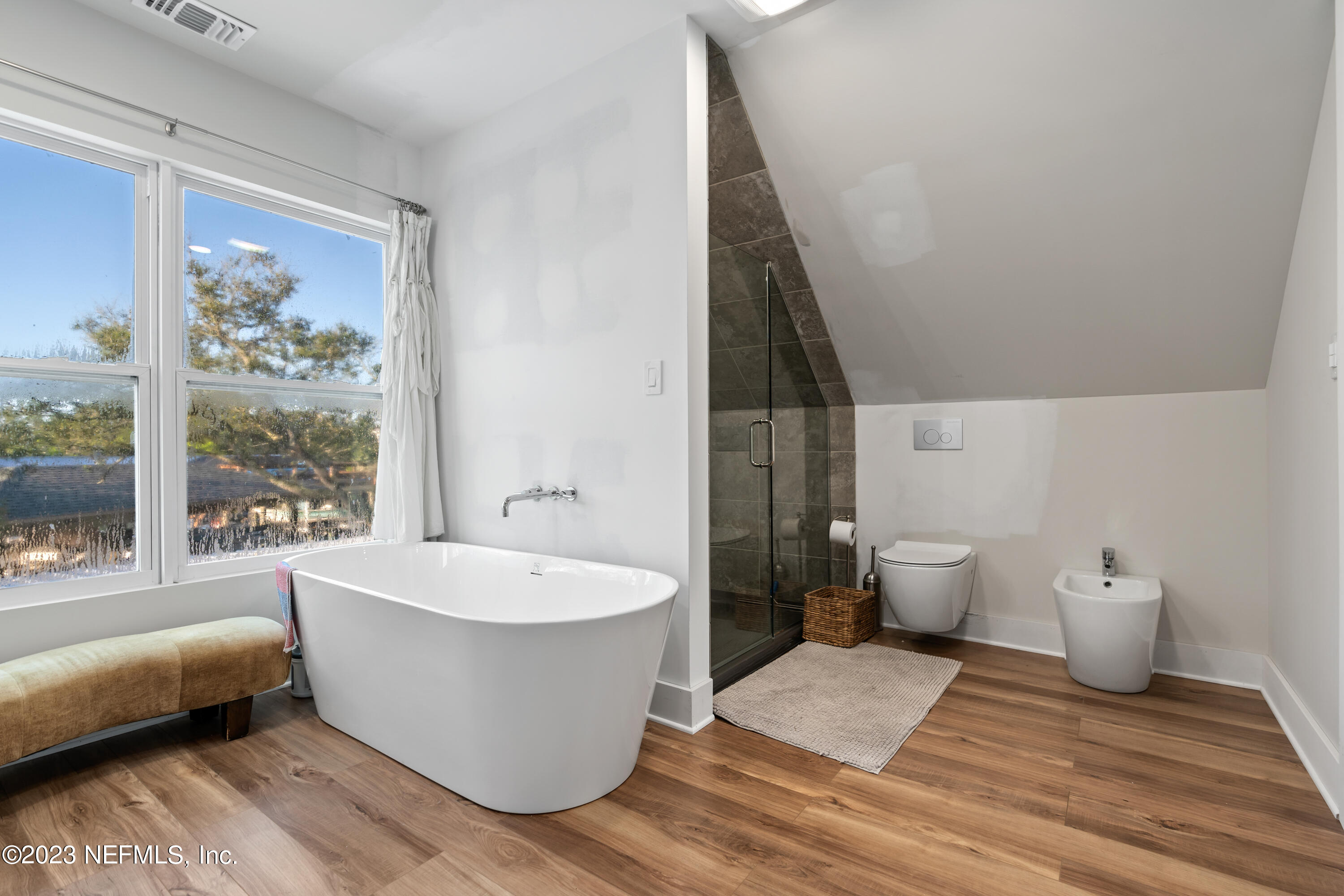 281 Ole Road St. Augustine, FL 32080 - Photo 51 of 61 a spacious bathroom with a bathtub and toilet