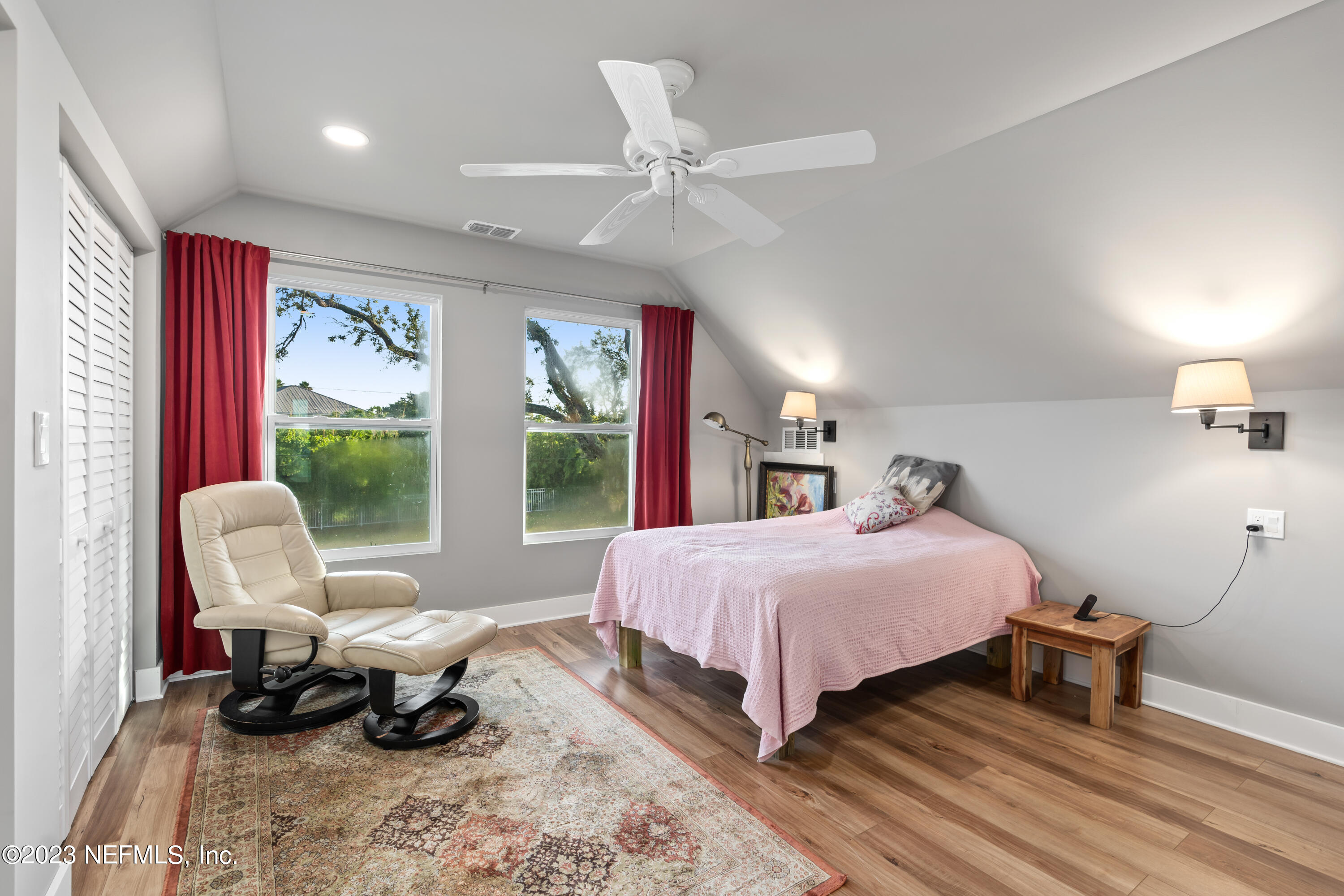 281 Ole Road St. Augustine, FL 32080 - Photo 53 of 61 a bedroom with a bed and large windows