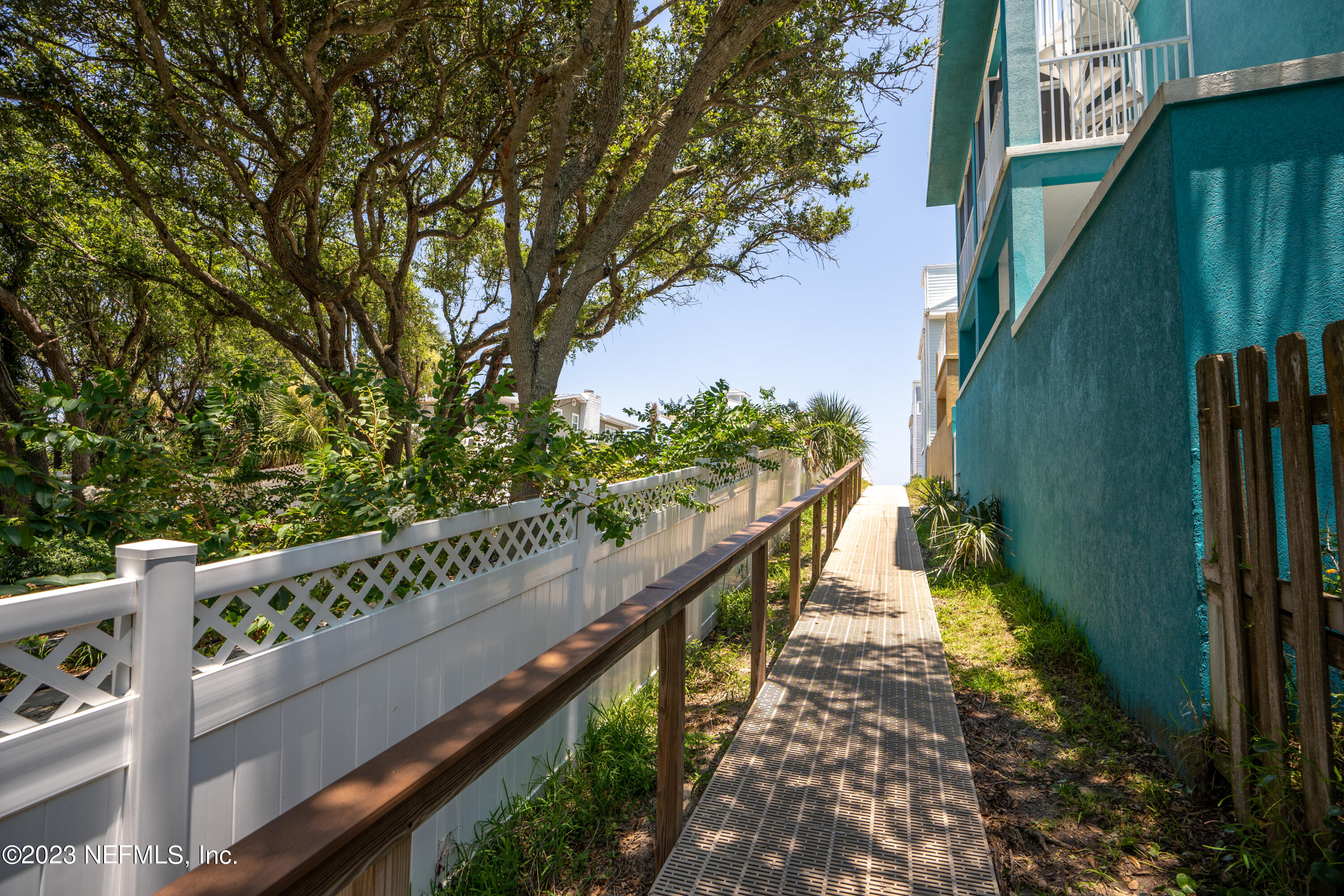 281 Ole Road St. Augustine, FL 32080 - Photo 57 of 61 a view of a balcony with wooden stairs