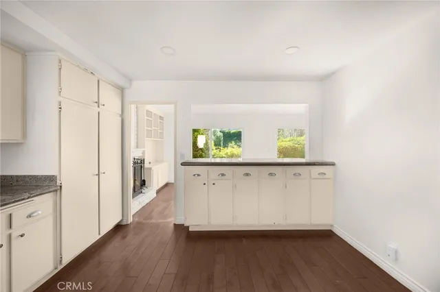 a view of kitchen with wooden floor