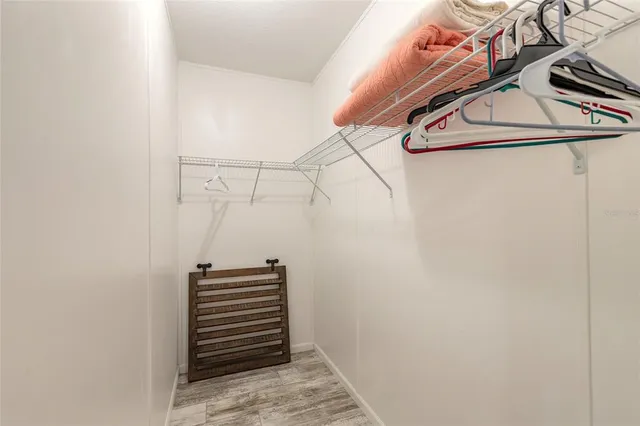 a view of a room with racks on the wall