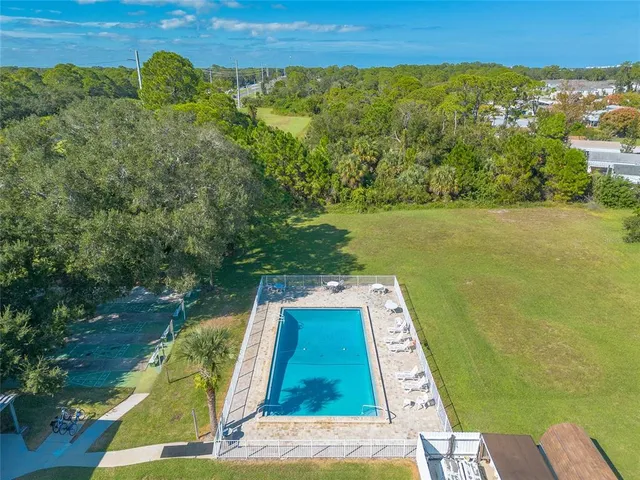 a view of a yard with a lake view