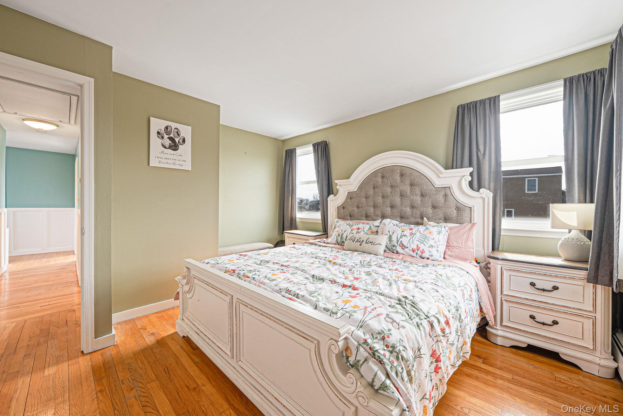 794 Pecan Street Lindenhurst, NY 11757 - Photo 30 of 44 a bedroom with a bed and a dresser