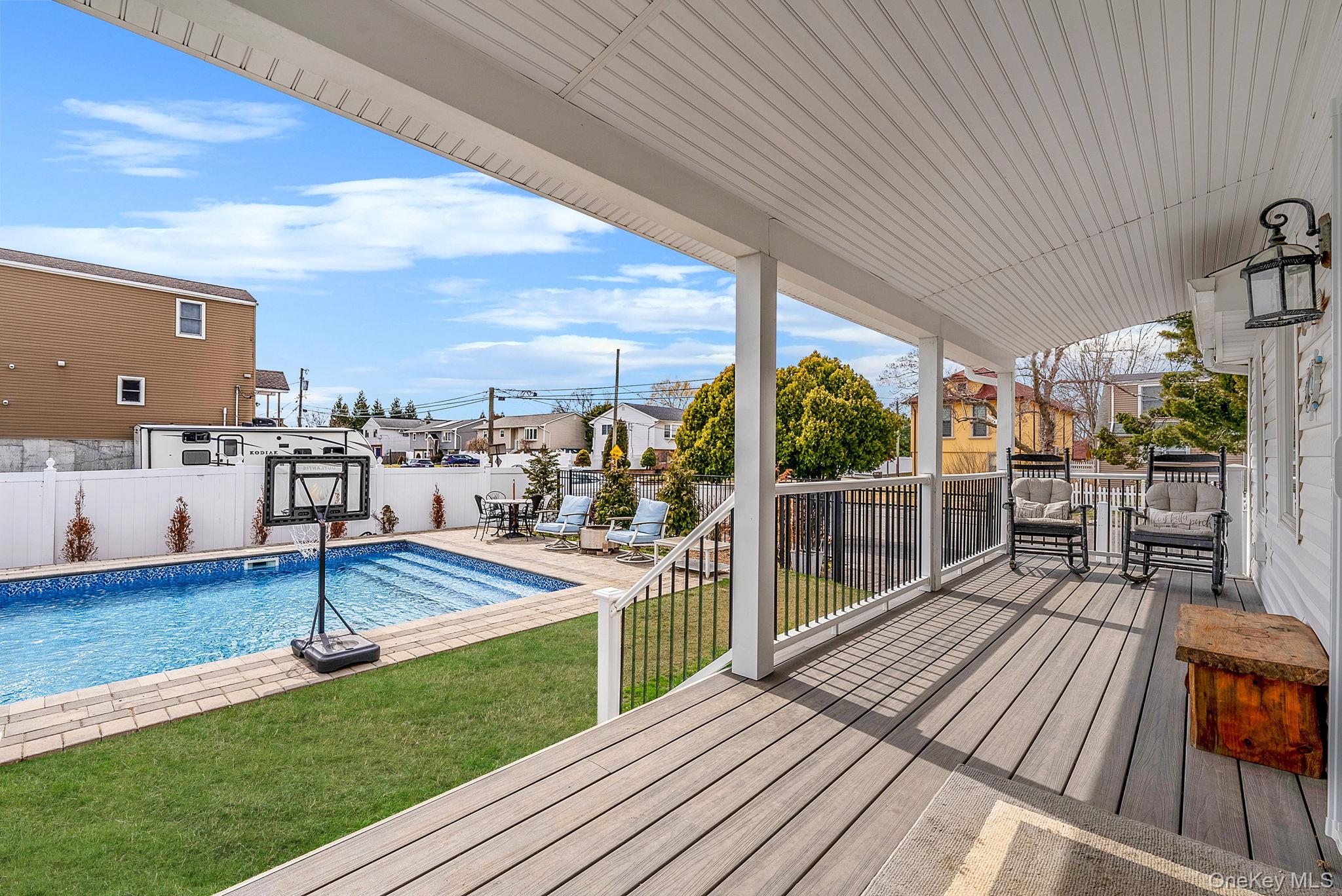 794 Pecan Street Lindenhurst, NY 11757 - Photo 5 of 44 a view of a living room and balcony