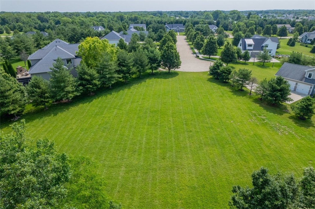 1935 Buckhead Court Decatur, IL 62521 - Photo 3 of 5 an aerial view of residential houses with outdoor space and trees