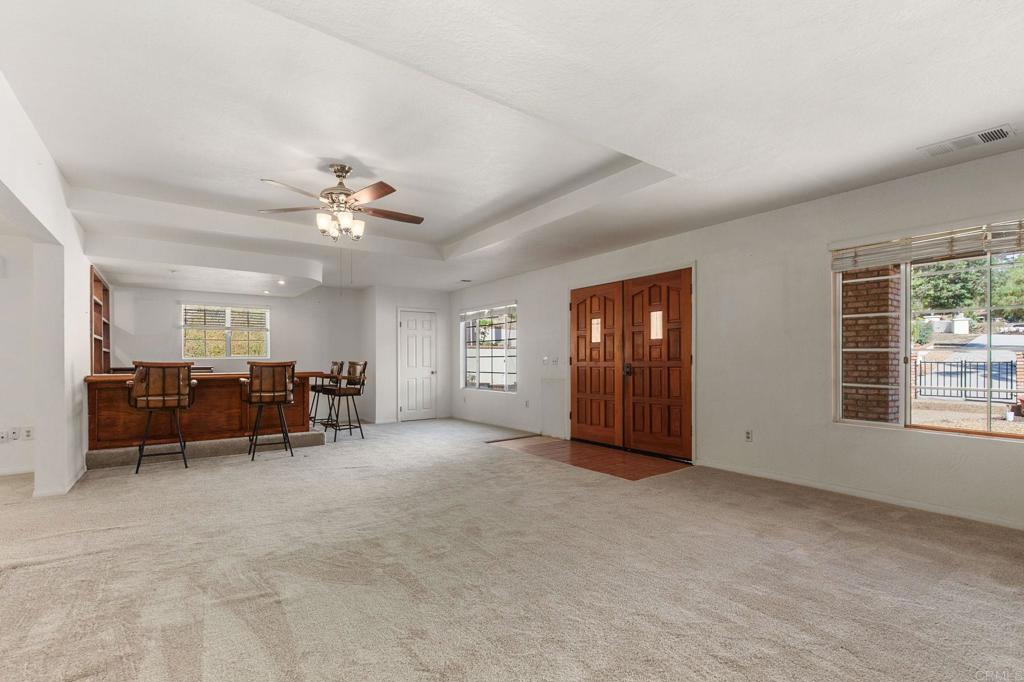 2573 Los Alisos South Fallbrook, CA 92028 - Photo 11 of 70 an empty room with furniture and a window