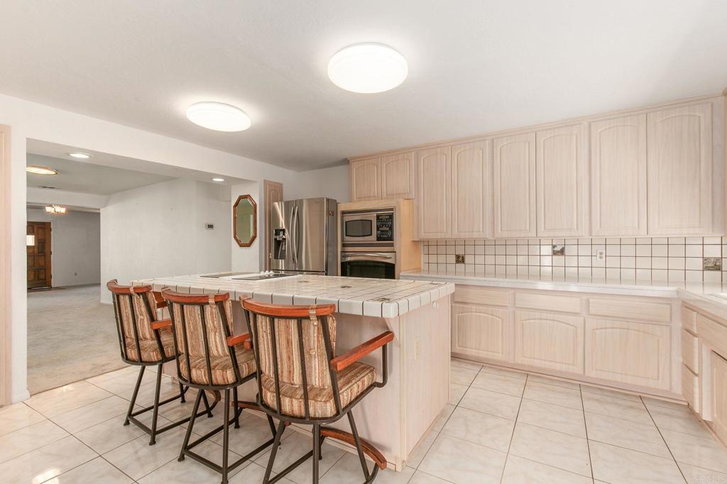 2573 Los Alisos South Fallbrook, CA 92028 - Photo 2 of 70 a kitchen that has a cabinets counter space and appliances