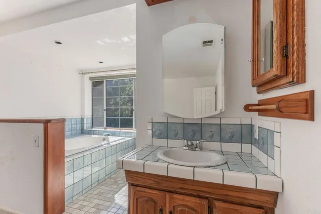 a house with trees in the background