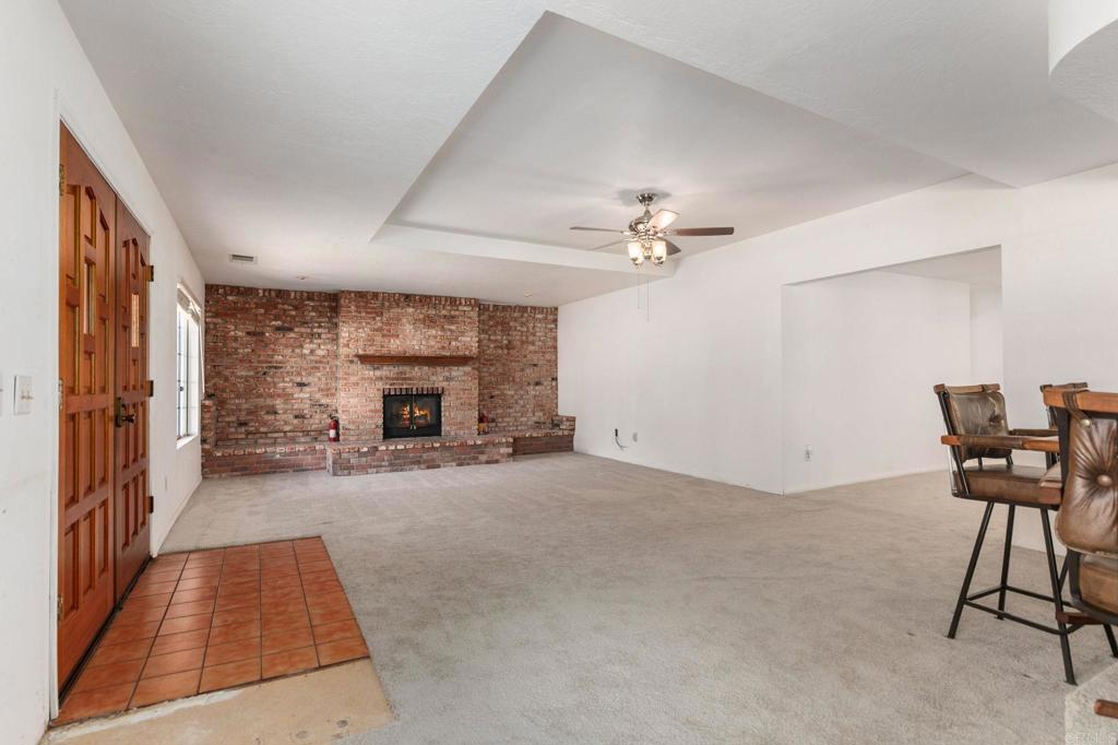 2573 Los Alisos South Fallbrook, CA 92028 - Photo 3 of 70 a view of livingroom with furniture and fireplace