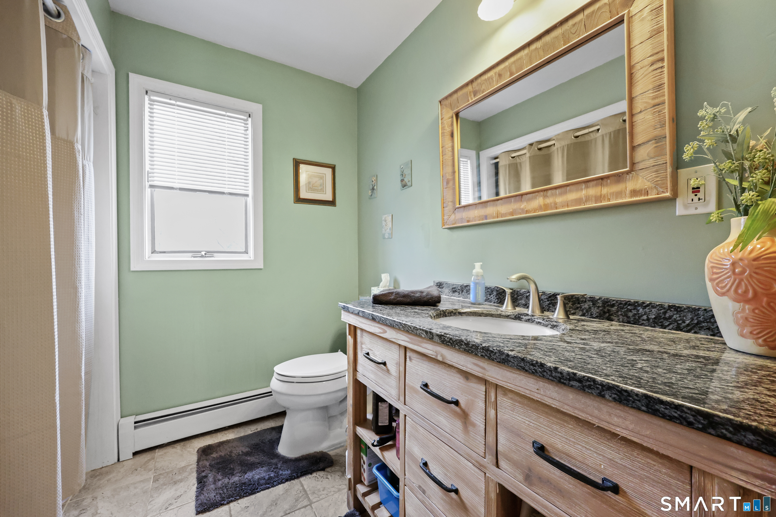 76 Shafer Road New Hartford, CT 06057 - Photo 15 of 25 First Floor Bathroom with shower & washer/dryer