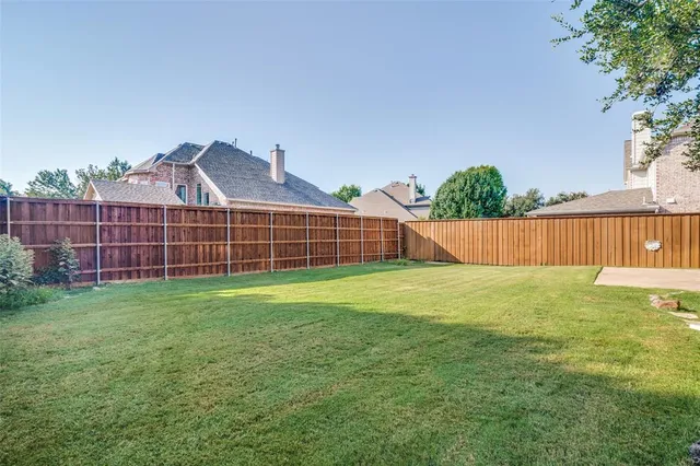 a view of a backyard with a garden