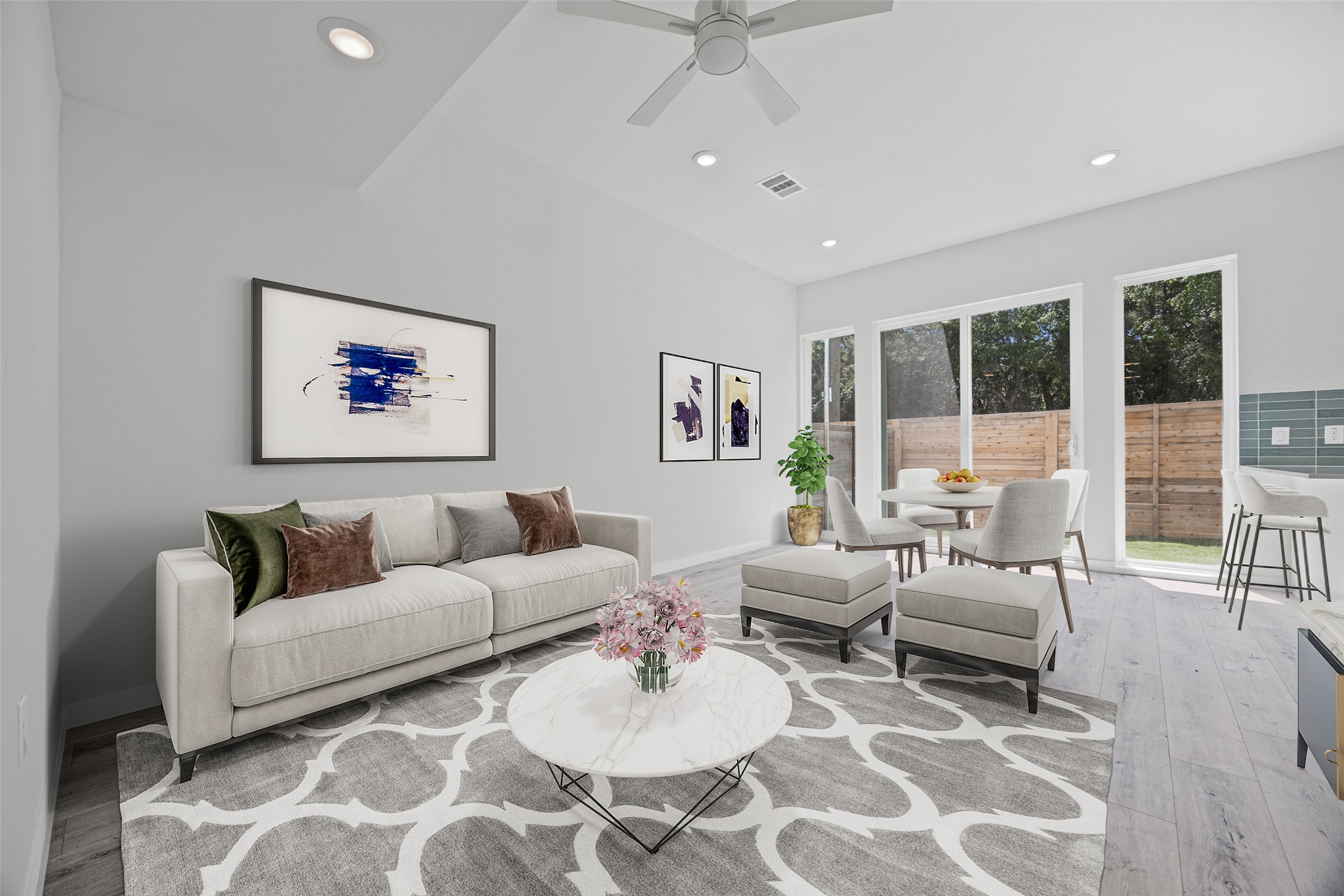 2000 Riverside Farms Road, Unit 5102 Austin, TX 78741 - Photo 8 of 25 Sun-filled open-concept living space boasts sleek flooring and direct patio access.