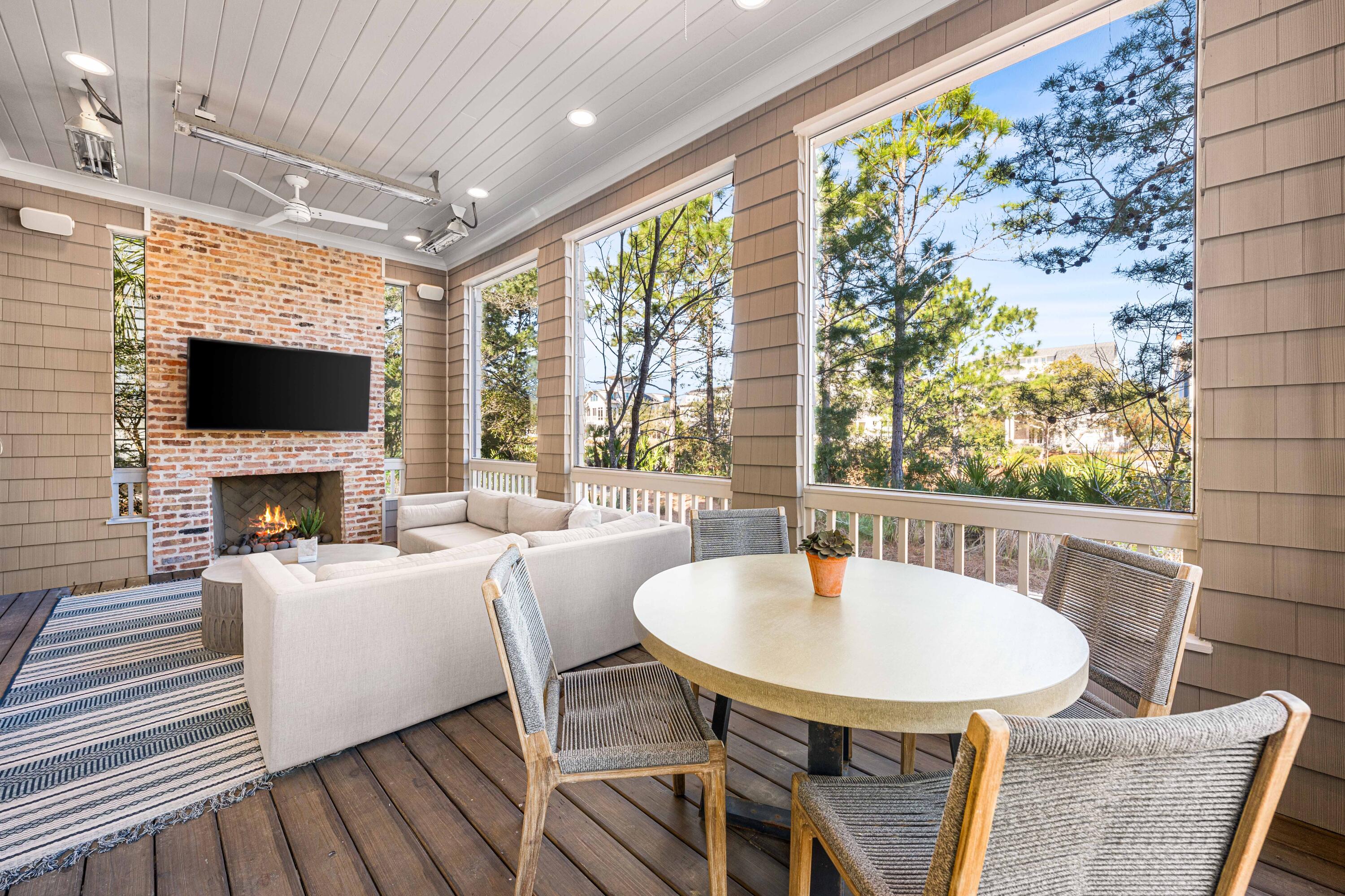 41 Compass Point Way Watersound, FL 32461 - Photo 18 of 75 a living room with fireplace furniture and a flat screen tv