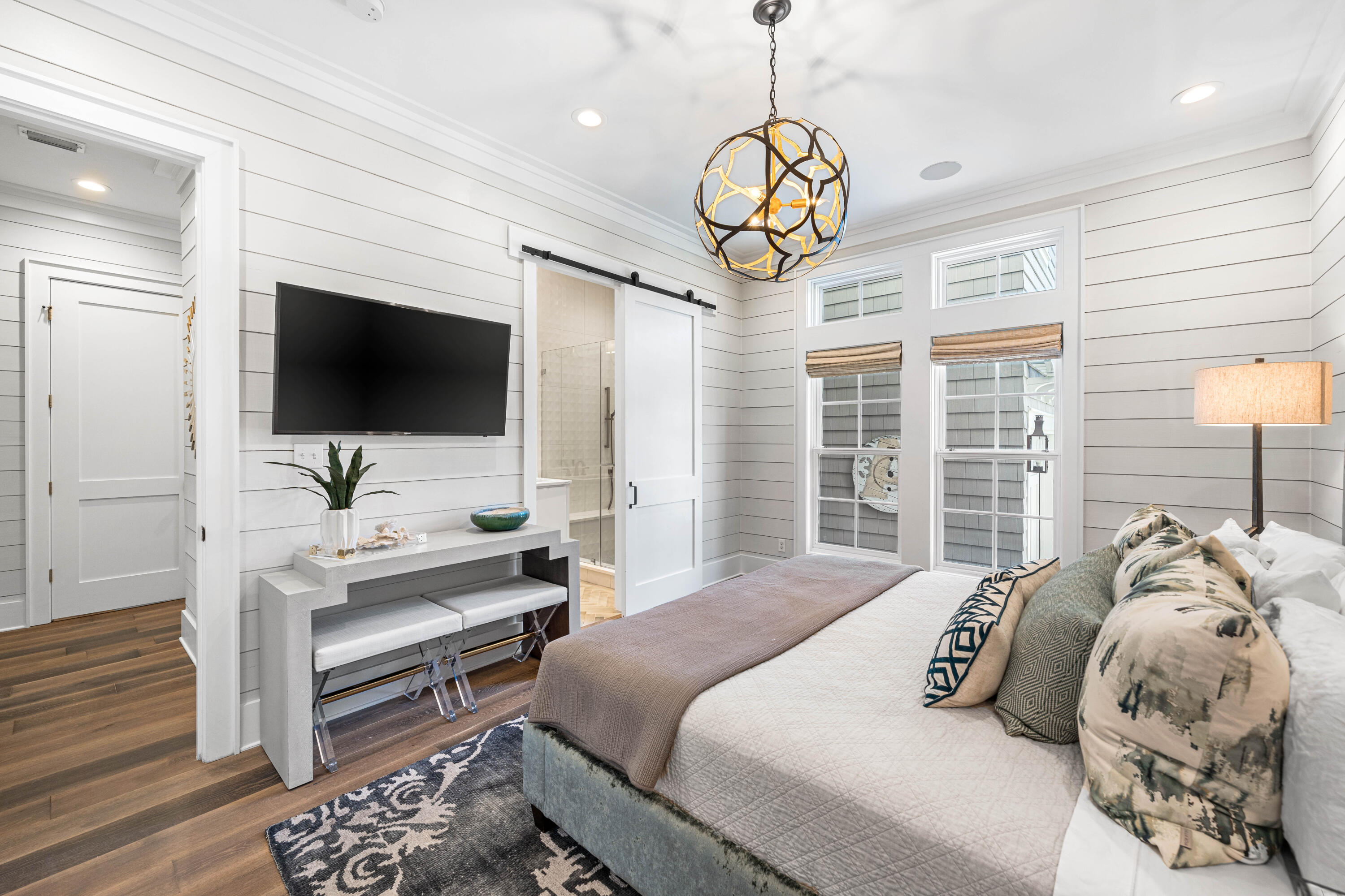 41 Compass Point Way Watersound, FL 32461 - Photo 21 of 75 a bedroom with a bed and a flat screen tv