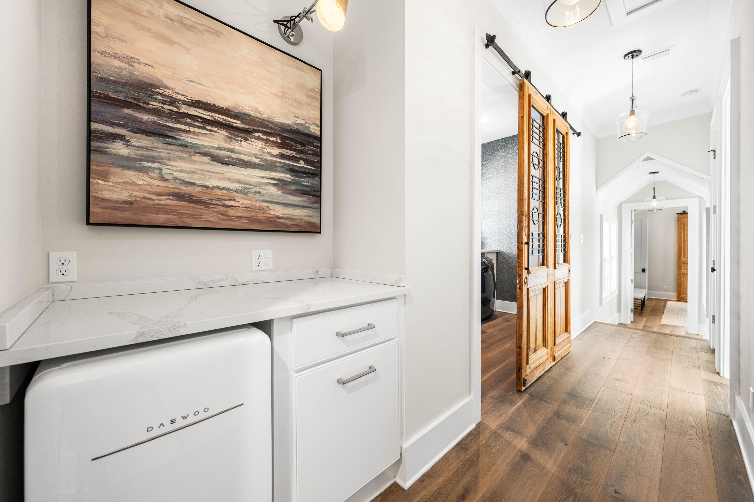 41 Compass Point Way Watersound, FL 32461 - Photo 27 of 75 a view of a hallway with wooden floor and staircase