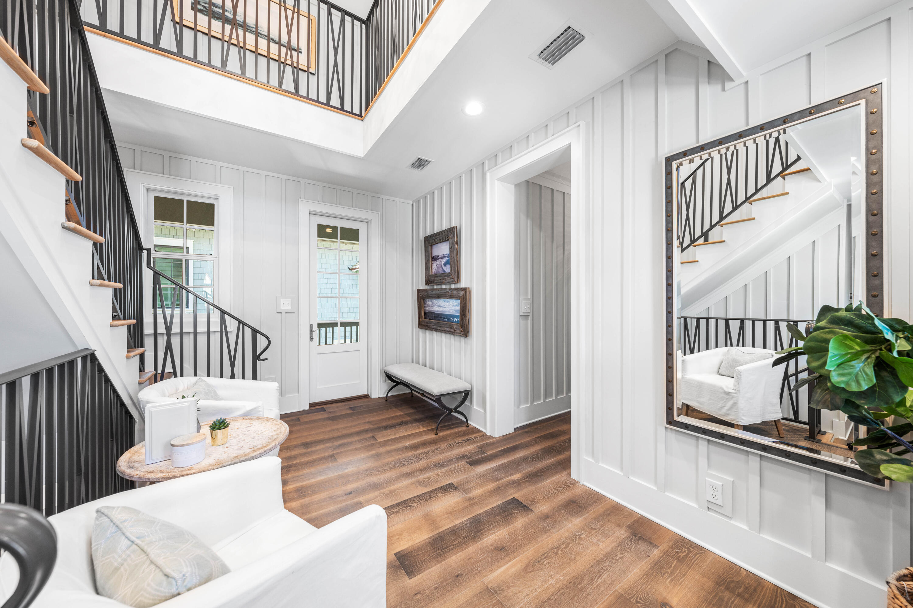 41 Compass Point Way Watersound, FL 32461 - Photo 30 of 75 a view of an entryway with wooden floor and windows